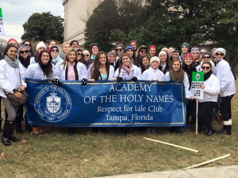 Academy girls proudly hold their banner before the March! Photo Credit: Julia Metzger