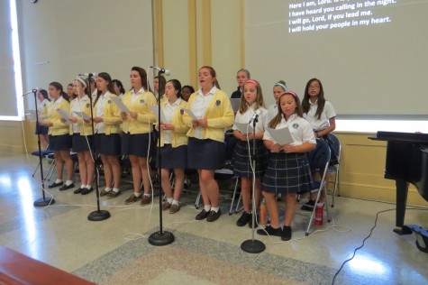 Our amazing choir singing so well during the all school mass 