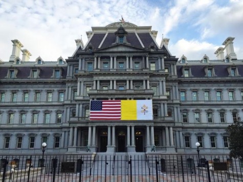 The Eisenhower Executive Office Building on the White House Complex displays both the US and Vatican flags in preparation for the Pope’s visit. 