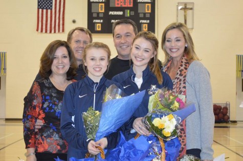 Bajo and Thompson were supported by both their parents on their special Senior Night