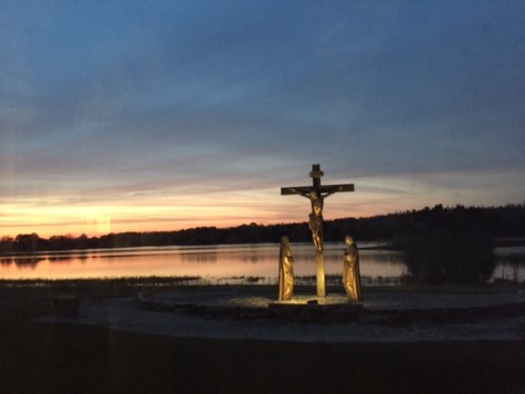 Before reading the letters, the seniors sat in the chapel during sunset with the beautiful view of the lake and crucifix. 