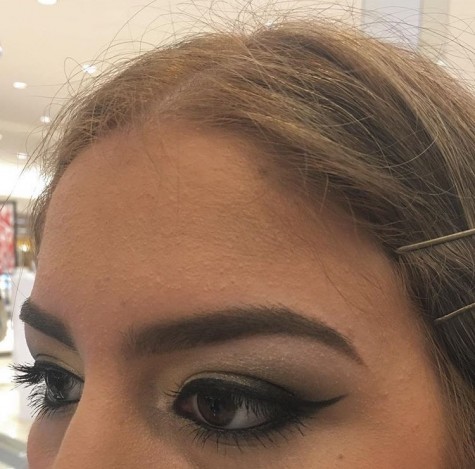 Alejandra Lozano, winged eyeliner done by the Mac makeup counter. 