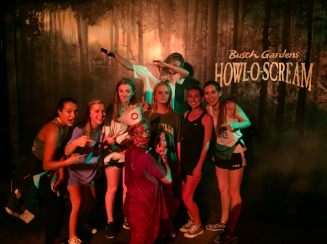 AHN Seniors pose with zombies at Howl-O-Scream in between scare zones. 