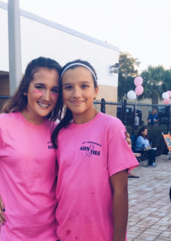 Freshman Joely Barkett(left)pictured here with Cailin Cannella (right), an Academy seventh grader and swimmer, recently diagnosed with cancer. The swim and volleyball teams painted their nails yellow in honor of her. Coach Bill Shaffer has emphasized to his team, "no one fights alone." #beatcancer