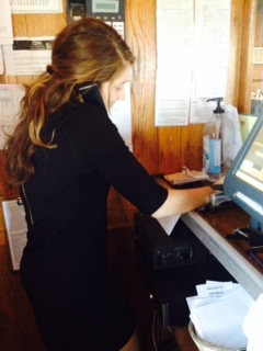 Alison Foley being a hostess at CDBs answering phone calls