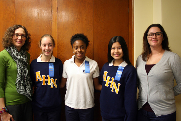 Award winners (from left to right) Hope Stephens, Khalea Armstrong, and Marie Dela Cruz with Principal Camille Jowanna and Freshmen Sponsor Ms. Devan Adams