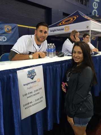 Senior Tiffany Reyes posing with Kevin Kiermaier at Rays Fan Fest,