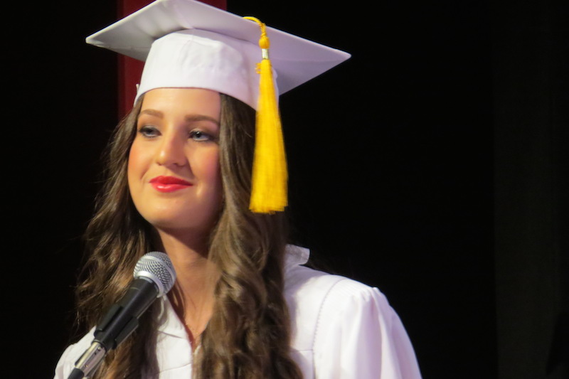 Maddy Babin gives one last smirk to end her Valedictorian speech.