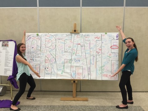 Sophomore's Leila Zupsic and Kathryn Byers pose next to the CREATE sign.