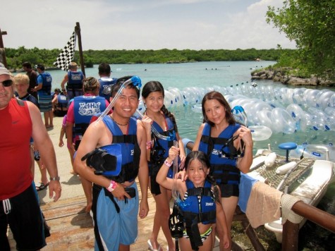 Marie Dela Cruz and her family try snorkeling in Cancun