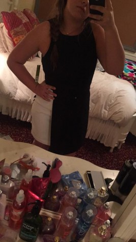 Senior Jackie Joyce taking a selfie in her 2015 homecoming dress