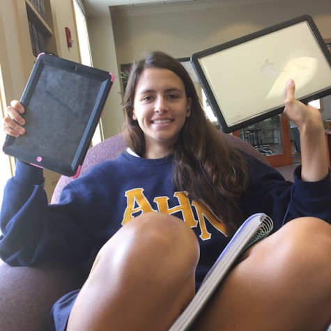 Junior, Devin Folkman, says she "loves the ablilty to use both an iPad and a MacBook"