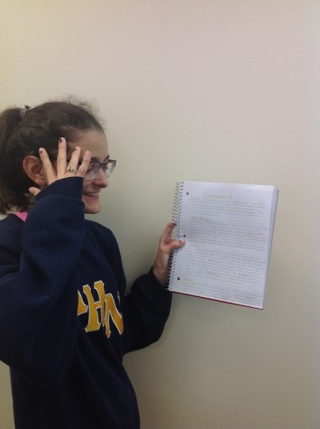 Senior Jennifer Amor reflecting on her detailed Government notes, which she says is her hardest class. Credit: Jacqueline Brooker