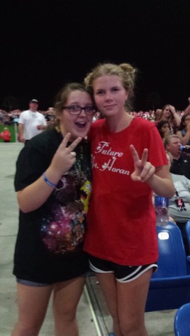Junior Jenna Wiley joins Megan Przedpelski, also a junior, at the 5SOS concert, this being the third time she has seen them since they first came to Tampa with One Direction. Credits: Vanessa Alvarez