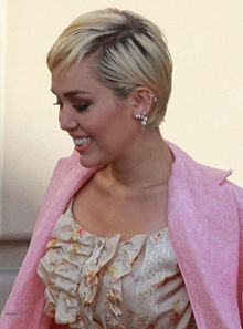 Miley Cyrus sporting her short, bleach blonde hair in 2015
