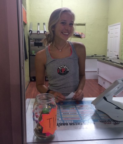 The Mrs. Penguin, Senior Grace Toups, stops for a quick picture while at work. Credit: Gabrielle Vivero