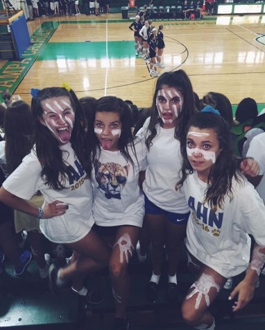 These freshmen have fun together cheering on the Jags at the TC vs. AHN volleyball game!