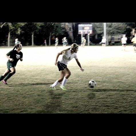 Lindsay Boos on the soccer field working towards a victory.