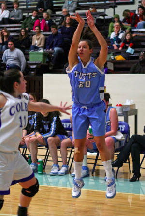 Filocco taking a jump shot in her game at Tufts University. 