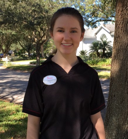 This chick, Madison Warnock, stops for a quick picture in her uniform before work. Credit: Madison Warnock