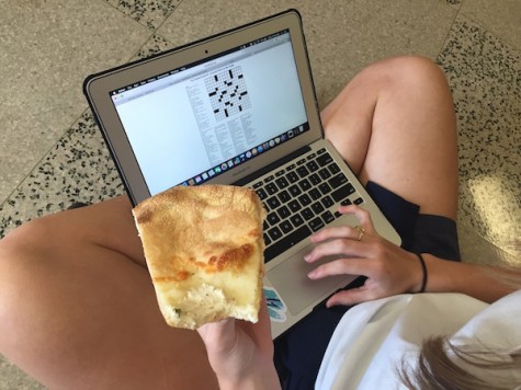 Photo Credit: Karlee Nipper Senior Audrey Cooper enjoys a snack while finishing her crossword puzzle!