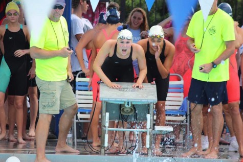 Gabby Delp and Lara Lontoc going crazy for their fellow swimmers. Credit: Lara Lontoc