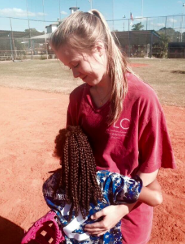 Photo Credits: Twitter/AHN TLC Christina Thompson and her buddy hug at the end of a fun game!