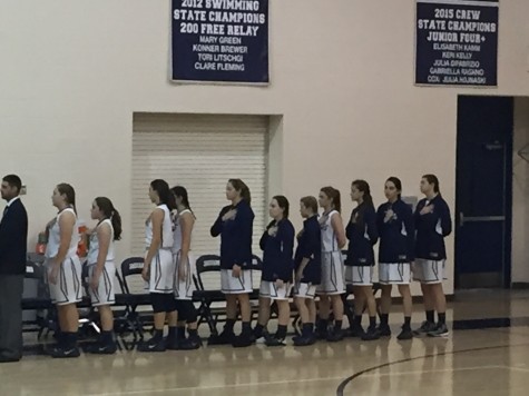 Jaguars sing the national anthem before the start of the game