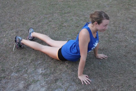 (Photo credit: Keri Kelly) Morris recommends sliding into "chaturanga" to stretch your abdomen and hip muscles.