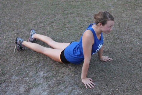 (Photo credit: Keri Kelly)  Morris recommends sliding into "chaturanga" to stretch your abdomen and hip muscles. 