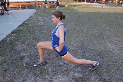 (Photo credit: Keri Kelly) This stretch, called runners lunge, will relieve tight hamstrings.