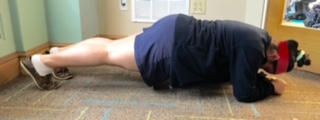 The goal is to hold a plank for 10-30 seconds.