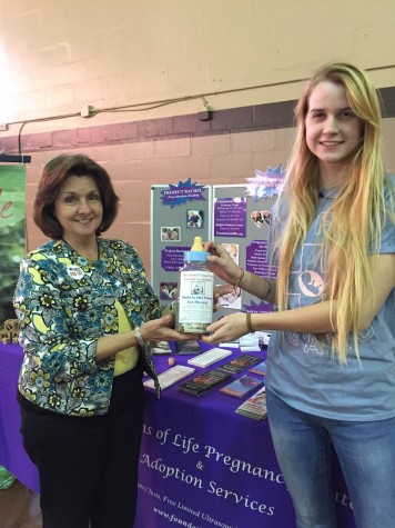 AHN Senior Mollie Johnson and President of AHN's Respect for Life Club raised money to donate for clinics for pregnant women to support mothers who chose life. Credit: Jacqueline Brooker/Achona Online 