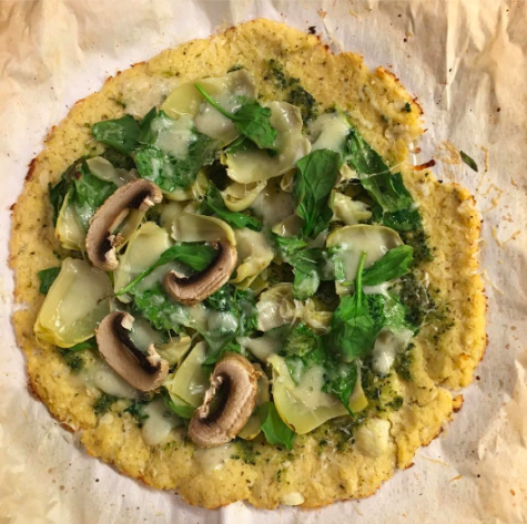 Senior Grace Toups shares her vegetarian creation, “a cauliflower pizza with spinach, artichoke, mushroom, pesto, mozzarella, Parmesan, and baby swiss cheese”. You go, Grace Toups.