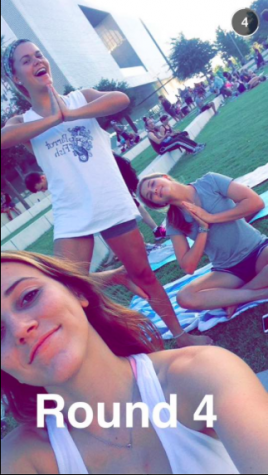 Seniors, Lindsay Boos and Hadley Chillura getting ready for yoga in the park. This is a fun way to get friends together to watch the sunset and meditate before the long week ahead.