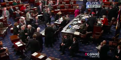 The majority of work for a Page, shown sitting on bottom right, is assisting the Senate staff. Credit: Grace Baxter/ Achona Online