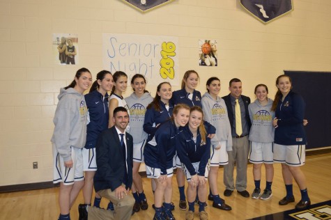 "Crazy Eights" help the basketball team get pumped up before big games, and it defiantly helped them in their thrilling overtime victory on Senior Night. 