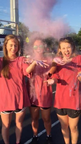 Into addition to raising money individually, TLC made money at their table by selling colorful powder and giving attendees henna tattoos. 