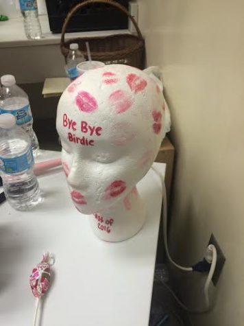 Credit: Avery Dierks This is the gift the cast gave to Mrs. Kimbler at the end of there last show. It is a styrofoam manikin head with the kissing of all of the performers. 