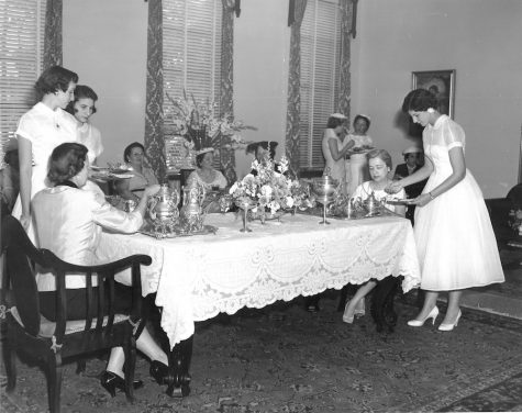 (Photo Credit: AHN Archives/ Used With Permission) In 1979 when this photo was taken, Silver Coffee still clung to it's tradition as a welcome back celebration for alumni mothers. Their daughters would have formally waited on them with silver teapots that are still used today.