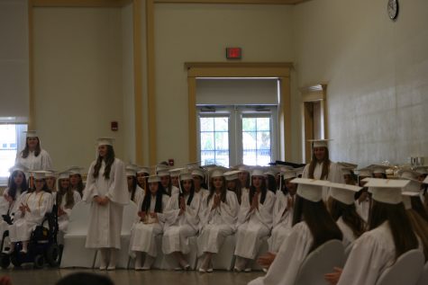 Each honors society announces their members and has them stand to be recognized during the ceremony. 