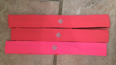 Paige Coleman shows off her love for pink with her Lululemon headband collection. 