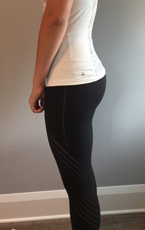 Kayla Eckermann reps her Lululemon yoga pants and tank top.