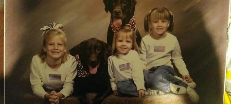 Covered in American flag apparel, Wiley (pictured in the middle) shows her patriotism at a young age. Photo Credit: Humane Society (used with permission)