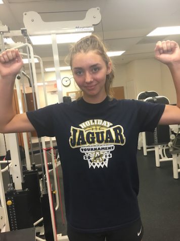 Katherine is flexing and ready for weight room day.
