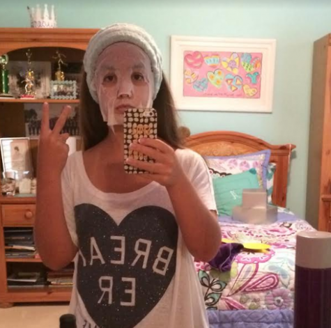 Senior Anna Padron sends off her best mirror selfie while prepping for Jesuit Homecoming, 2014.