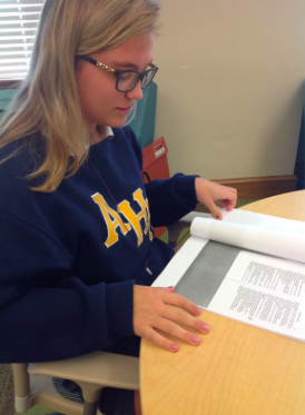 Junior, AnnMarie Collins, studies her lines to prepare for her role as Mickey. Photo Credit: Sara Phillips/AchonaOnline 