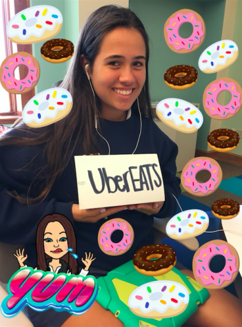 Junior Alexis Alvarez enjoys her SOHO donut brought to her by uberEATS