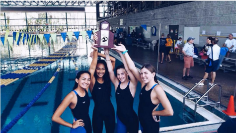 Heath pictured here at the 2015 Regions Swim Meet with teammates Chloe Paman, Lara Lontoc and Mary Kate Urbanski.