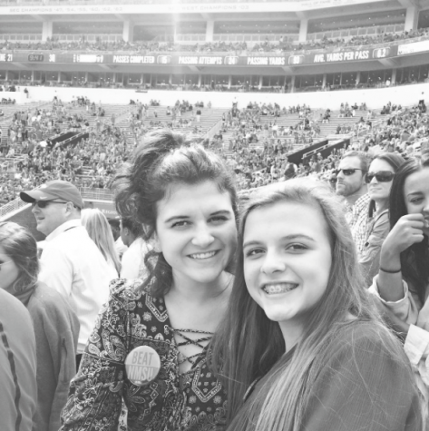 Freshman Sara Viviero poses with her sister, Alumni Gabi Vivero, during the Ole Miss game